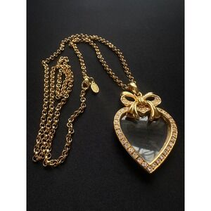 Vintage Joan Rivers Gold Tone Heart Magnifying Glass Pendant Necklace.